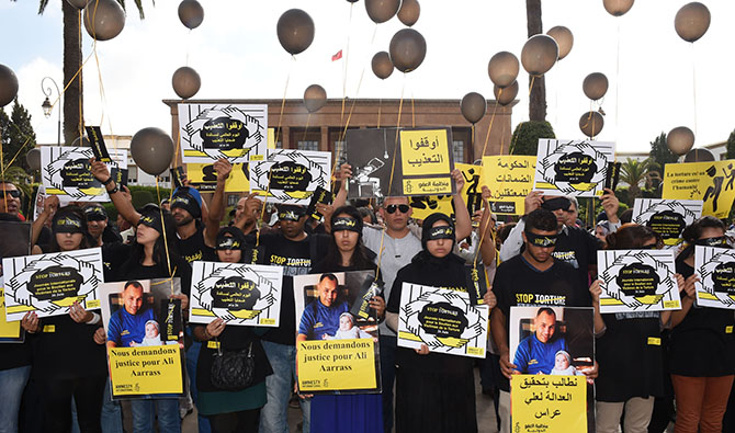 Des Marocains manifestent contre la torture sur appel d'Amnesty International. Photo, Fadel SENNA/AFP