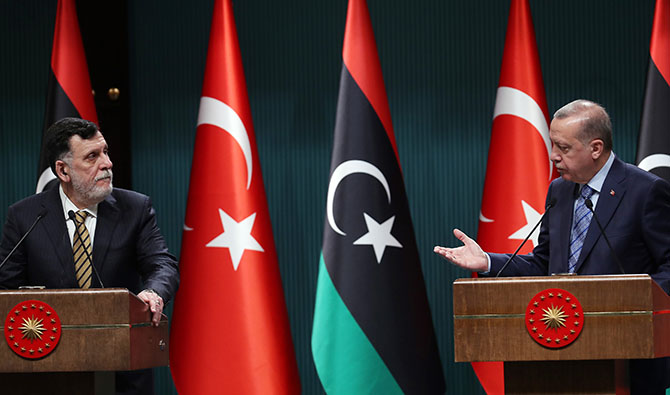 Recep Tayeb Erdogan et Fayez Al Sarraj lors d'une conference de presse. Photo, Adem ALTAN / AFP