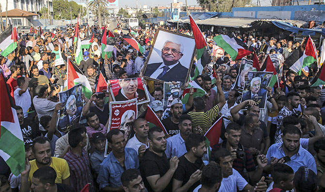 Des Palestiniens manifestent contre l'annexion israélienne a Gaza. Photo, Said KHATIB