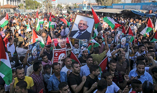 Des Palestiniens manifestent contre l'annexion israélienne a Gaza. Photo, Said KHATIB