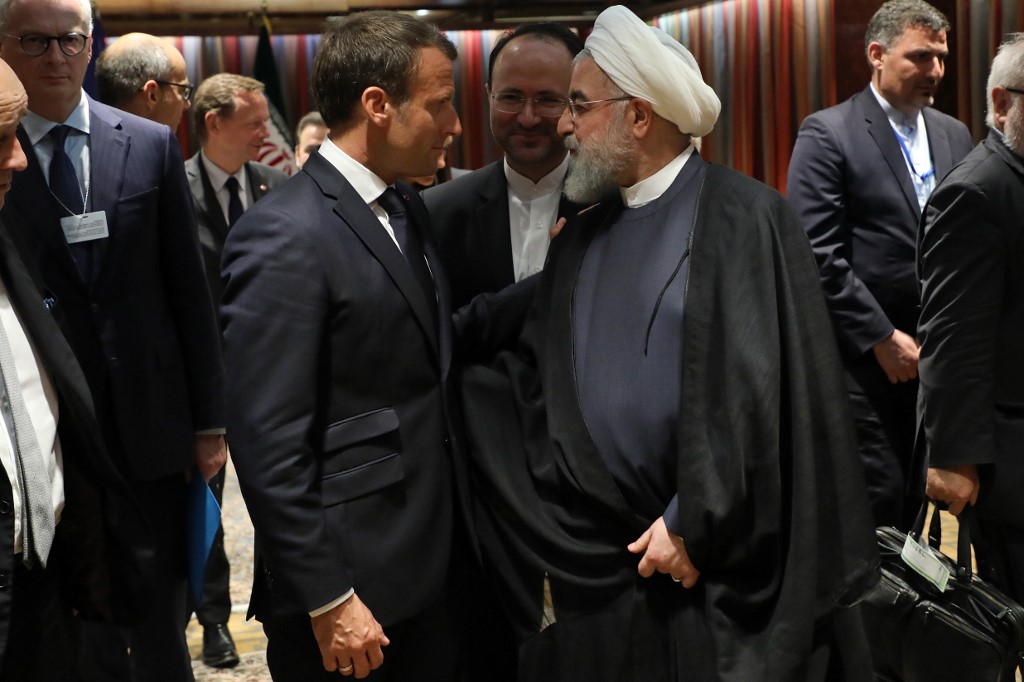 Emmanuel Macron et Hassan Rohani en discussion au siège des Nations Unies en septembre dernier. (Ludovic MARIN/AFP)