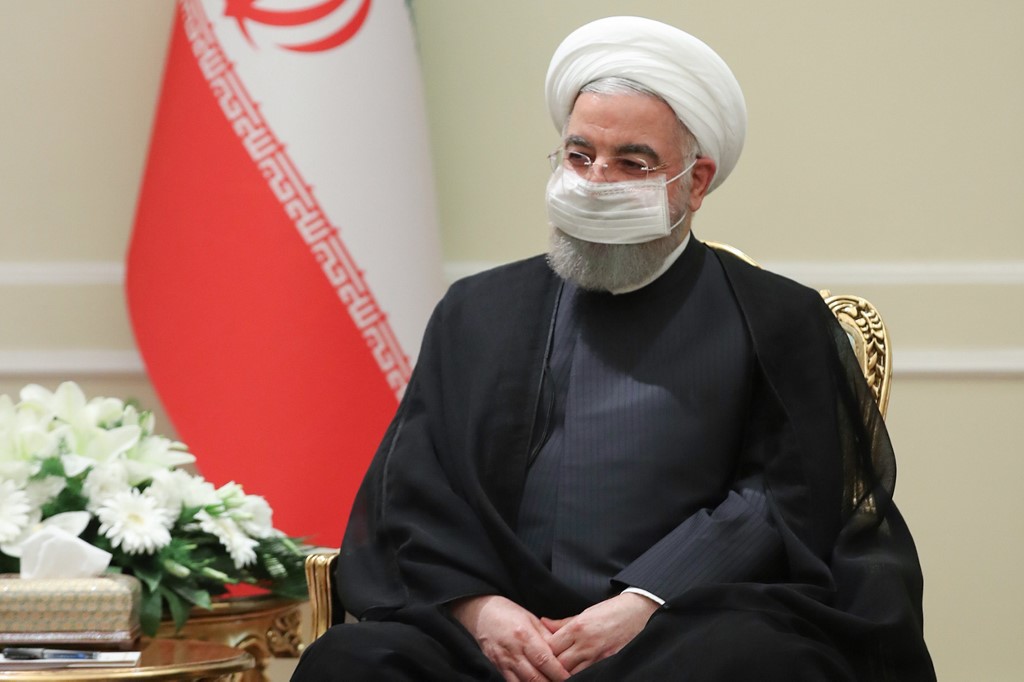 Le président Hassan Rohani rencontrant le directeur général de l'Agence internationale de l'énergie atomique (AIEA) à Téhéran (Présidence iranienne / AFP)