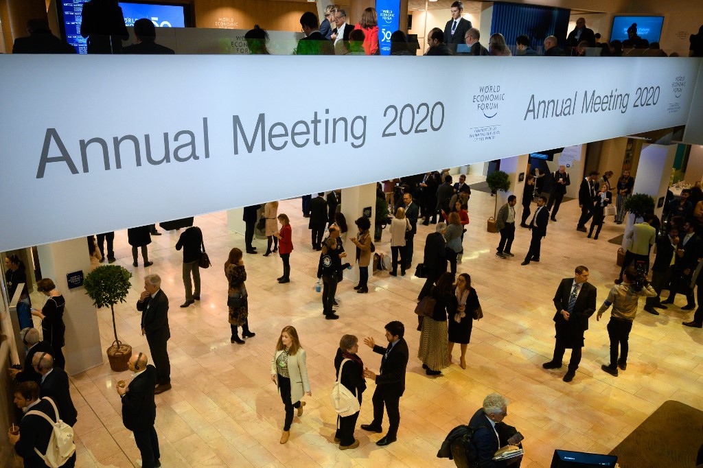 Les participants se rassemblent au centre des congrès lors de la réunion annuelle du Forum économique mondial (WEF) à Davos, en Suisse orientale (Fabrice Coffrini/AFP)