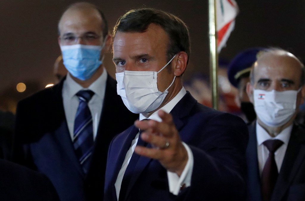 Le président français Emmanuel Macron à son arrivée à l’aéroport de Beyrouth le 31 août (Photo, Gonzalo FUENTES/POOL/AFP).