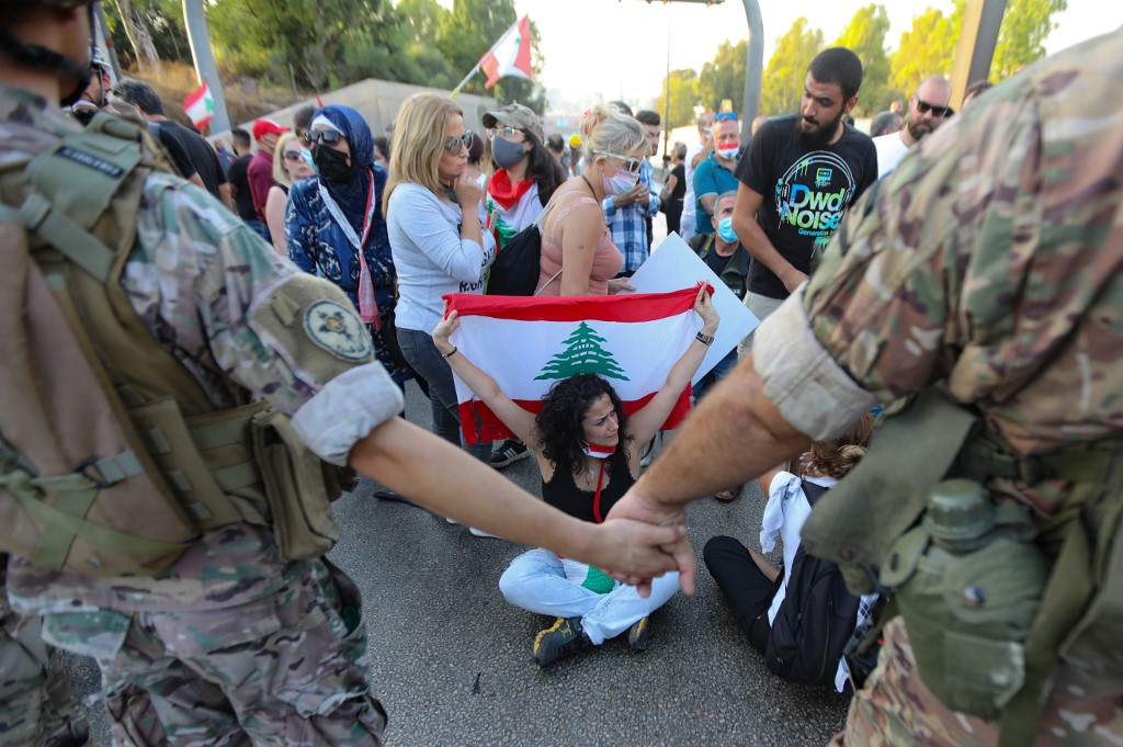 Manifestation en protestation contre le manque de progrès de l’enquête sur l’explosion au port de Beyrouth, à Baabda (Liban) le 12 septembre (Photo, Anwar AMRO/AFP).