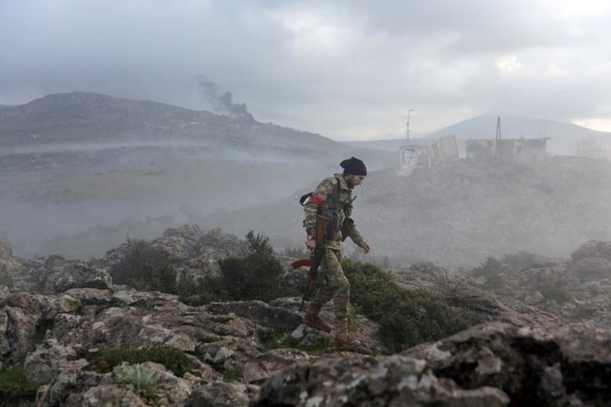Un combattant de l'armée syrienne libre soutenue par la Turquie est vu à Afrin, en Syrie, le 2 mars (Reuters)