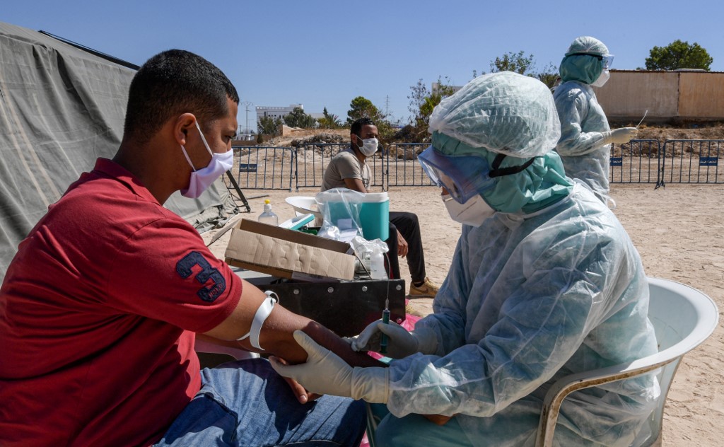 Virus: Tunis recevra ses premiers vaccins en mars selon le ministère