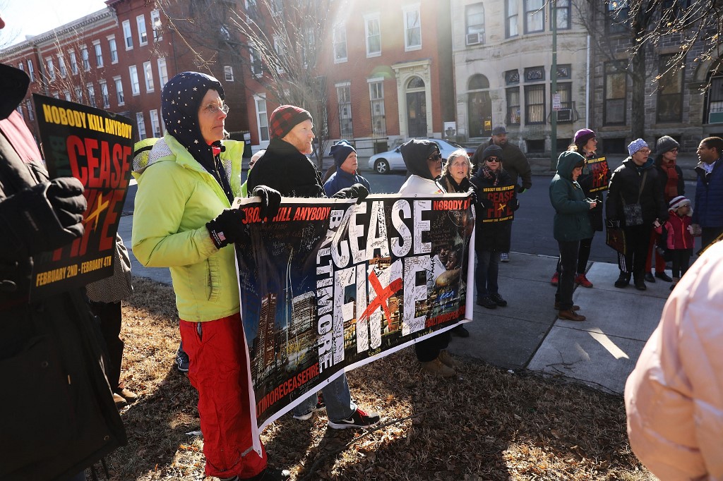 Des militants, des habitants et ceux qui ont perdu un être cher à cause de la violence participent à une "Marche pour la paix et la guérison" à Baltimore, aux États-Unis. (Photo, AFP/Archives)