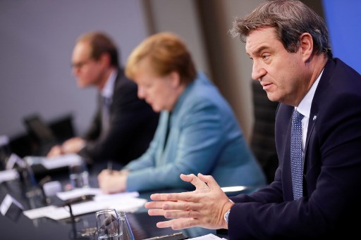 Macron va s'entretenir avec le favori des sondages pour succéder à Merkel