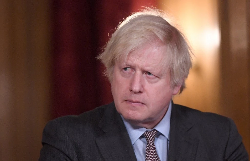Le Premier ministre britannique Boris Johnson assiste à une conférence de presse virtuelle à l'intérieur du 10 Downing Street, au centre de Londres, le 3 février 2021. (Photo, AFP)