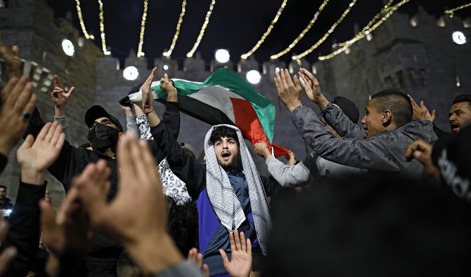 Les Palestiniens célèbrent leur victoire à Jérusalem, mais d'autres tensions se profilent