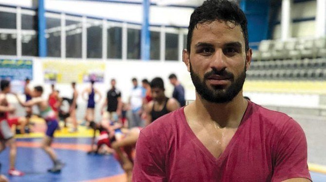 L'Iran menace de tuer le frère du lutteur olympique exécuté