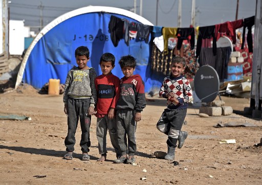 Le camp d'Al-Jadaa à la périphérie d'al-Qayyarah, au sud de Mossoul, le 11 février 2021. Le retour de dizaines de familles irakiennes soupçonnées de liens avec le groupe État islamique de Syrie à Mossoul a suscité des craintes parmi les habitants d'une région qui a vécu les horreurs du régime de l'EI. (Zaid AL-Obeidi / AFP)