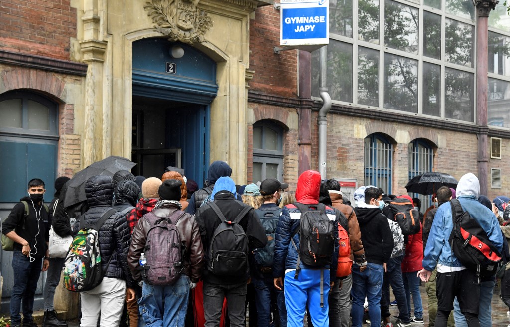 Près de 550 migrants mis à l'abri après l'évacuation d'un jardin parisien