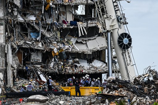 Le bilan s'établit pour le moment, sans tenir compte de ces nouvelles dépouilles, à au moins 12 morts et 149 personnes portées disparues, selon les autorités (Photo, AFP)