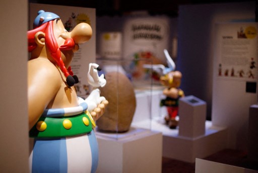 Des maquettes des personnages d'Obélix, du chien Idéfix et Astérix exposées à la Bibliothèque nationale de France (BnF), le 9 octobre 2013, à Paris (Photo, Thomas SAMSON / AFP)