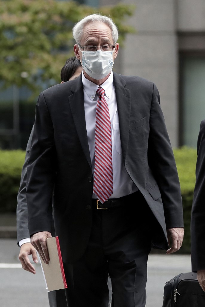 Greg Kelly, ancien directeur représentant de Nissan Motor Co., arrive avant sa comparution devant le tribunal de district de Tokyo (photo d'archives) (AFP)