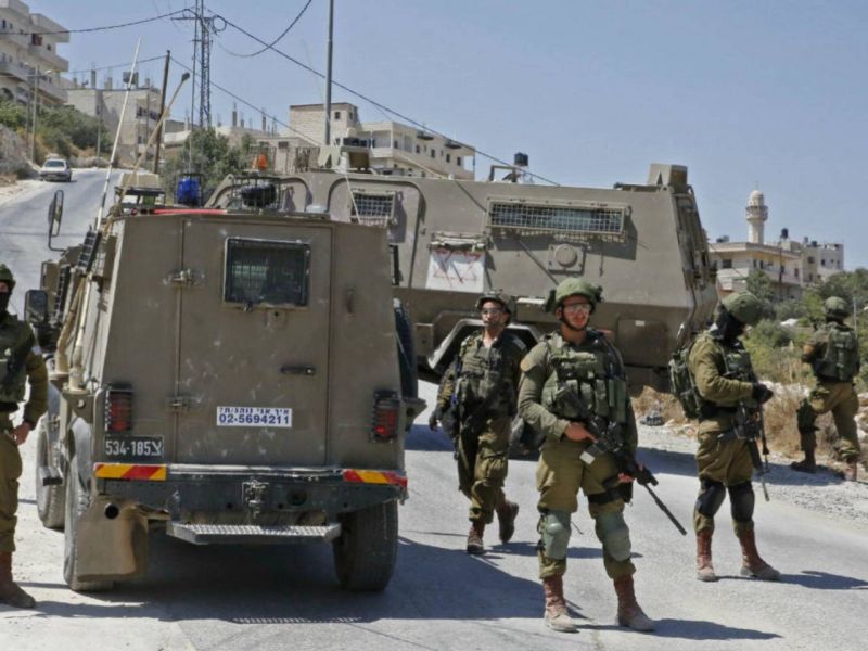 Des soldats israéliens dans le village de Beit Fajjar, en Cisjordanie occupée, le 8 août 2019. Hazem Bader, AFP