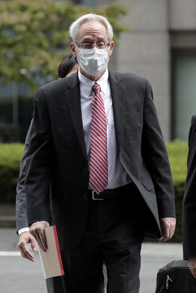 Greg Kelly, ancien directeur représentant de Nissan Motor Co., arrive avant sa comparution devant le tribunal de district de Tokyo (photo d'archives) (AFP)