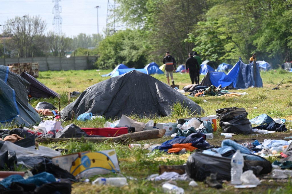 This photograph shows a migrants camp, in Grande-Synthe on the outskirts of Dunkirk, northern France, on May 12, 2021. (Denis CHARLET / AFP)
