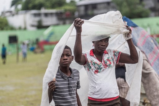 Séisme, tempête et inondations: le calvaire sans fin des Haïtiens