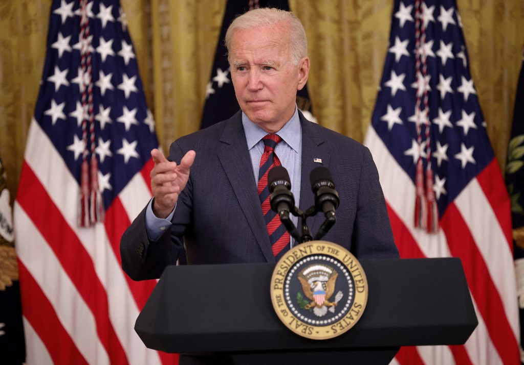 Biden vante ses efforts pour vacciner le monde et l'Amérique