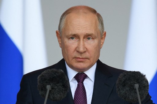 Poutine appelle les Russes au patriotisme avant un scrutin sans opposants