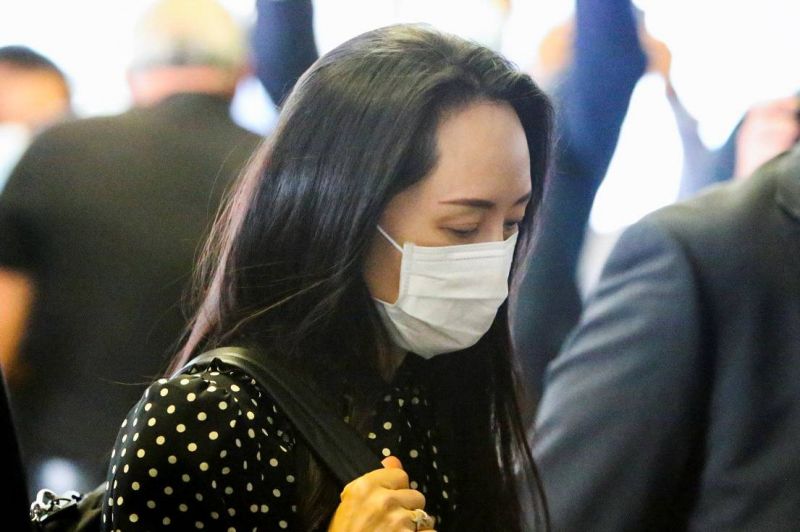 La dirigeante de Huawei de retour en Chine qui libère deux Canadiens