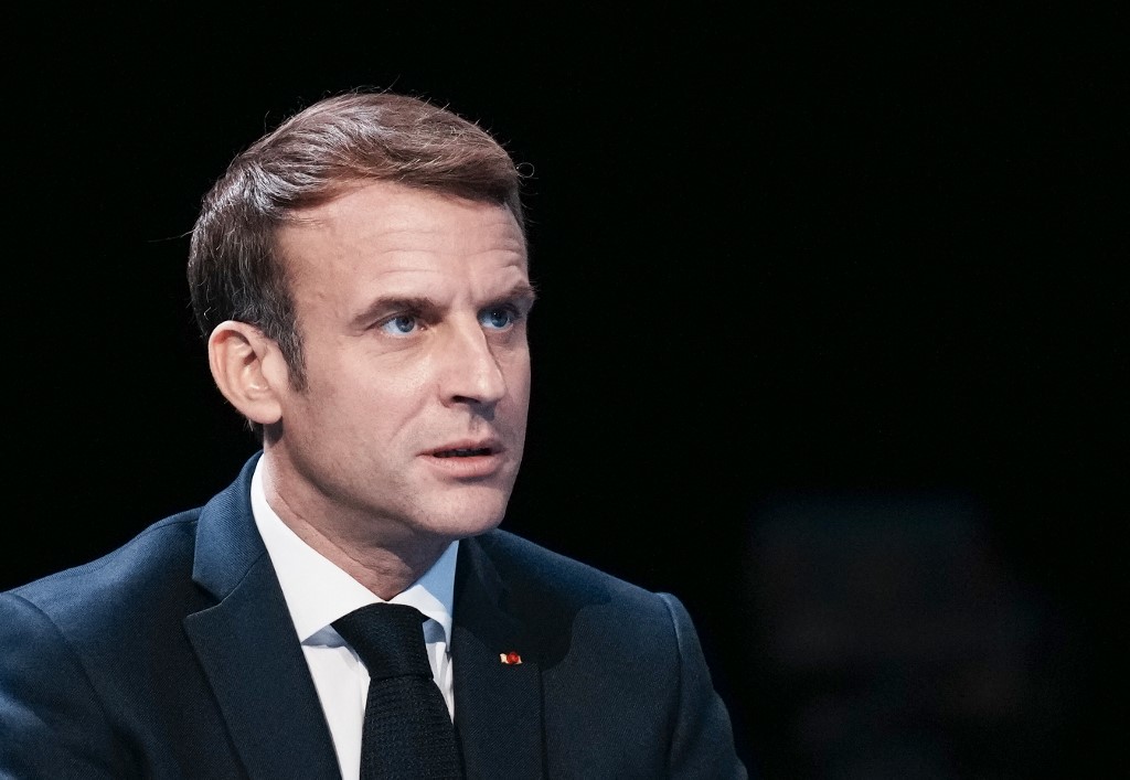 "Les pays qui confinent les non-vaccinés sont ceux qui n'ont pas mis en place le passe. Cette mesure n'est donc pas nécessaire en France", explique le chef de l’État (AFP)