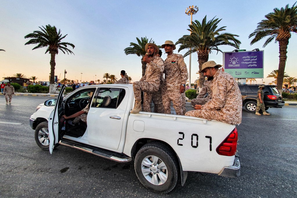 Libye: déploiement d'hommes armés à Tripoli, tractations entre candidats