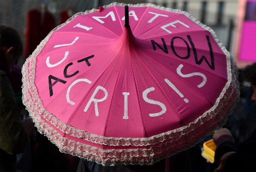 Manifestation de militants du climat à l'extérieur de la Conférence sur le changement climatique COP26 à Glasgow le 12 novembre 2021. (Andy Buchanan/AFP)