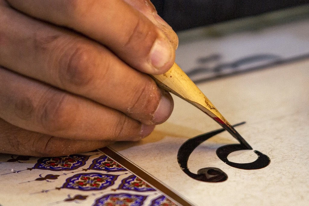 En Irak, préserver la calligraphie arabe contre vents et marées