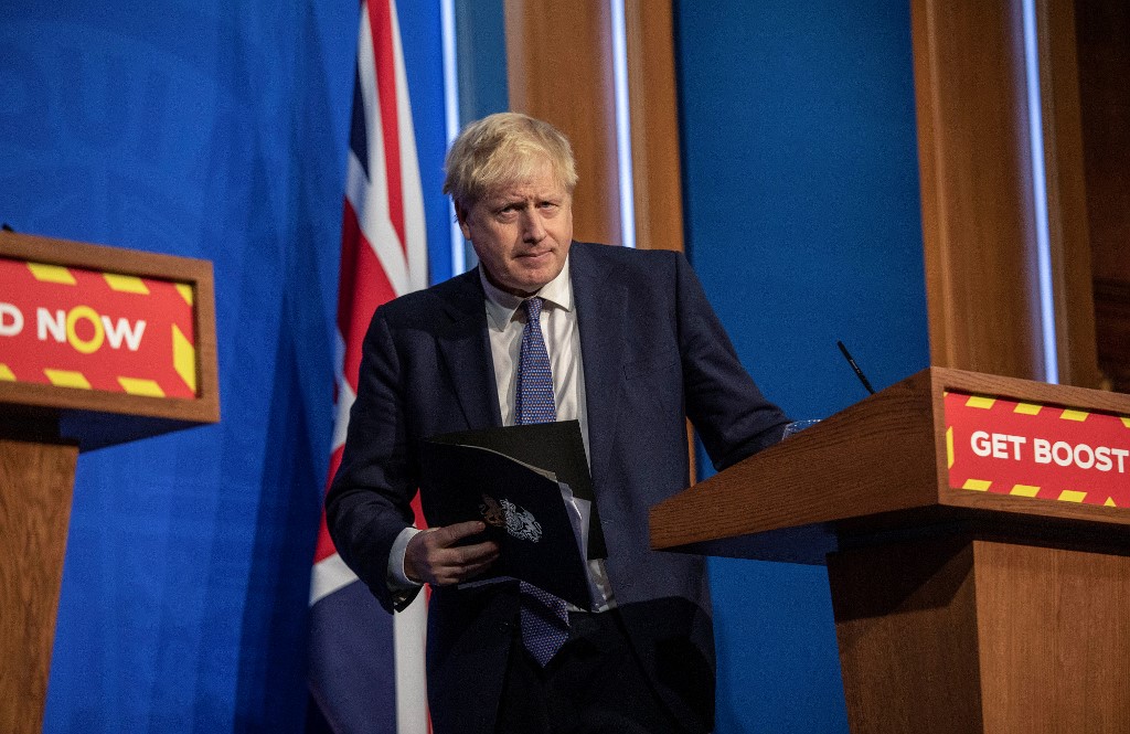 Le Premier ministre britannique Boris Johnson, dans la salle de briefing de Downing Street, dans le centre de Londres, le 4 janvier 2022.(AFP)
