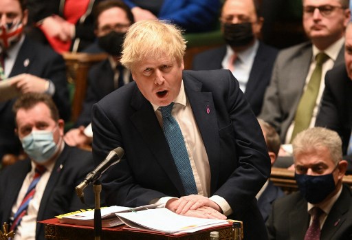 Le Premier ministre britannique Boris Johnson lors de la séance des questions au premier ministre (PMQ) à la Chambre des communes à Londres le 26 janvier 2022. (Jessica Taylor / Parlement britannique / AFP)