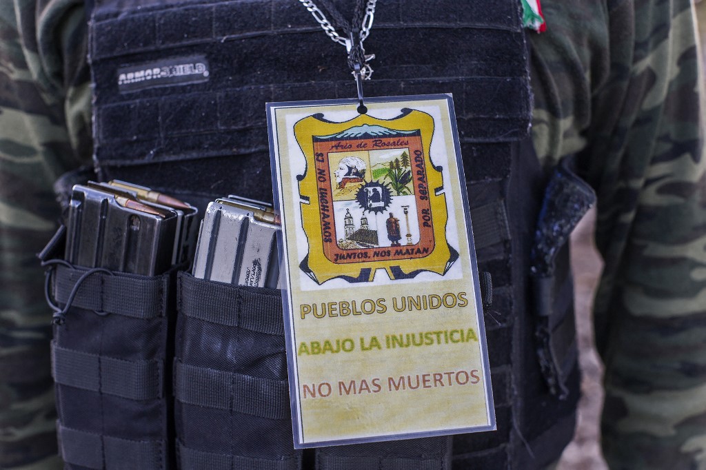 Badge d'agent de police à Ario de Rosales (Mexique). Crédits: AFP