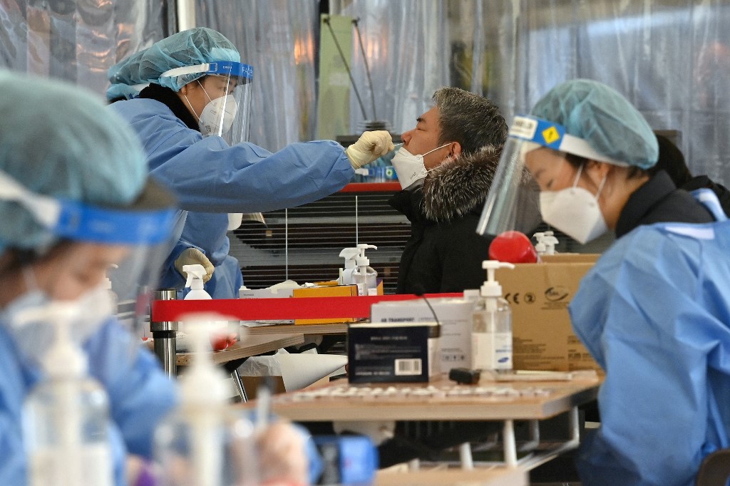 Centre de tests PCR à Séoul. Crédits: AFP