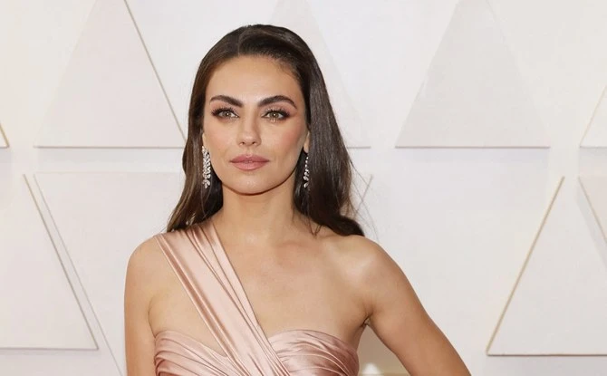 Mila Kunis était l'une des présentatrices de la soirée. AFP