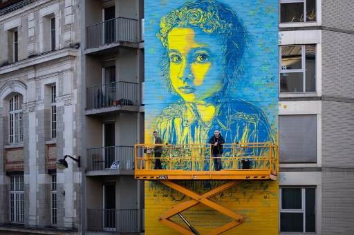 Le street artiste C215 peint «des sourires et de l'humanité» sur les murs d'Ukraine