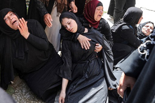 Les forces de sécurité israéliennes ont fait une descente dans le district brûlant de Jénine en Cisjordanie le 9 avril, tuant un Palestinien et en blessant d'autres, après avoir juré qu'il n'y aurait «pas de limites» pour freiner la montée de la violence. (Jaafar Ashtiyeh/AFP)