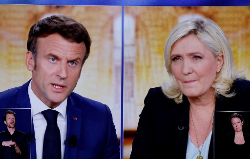 Réactions politiques au débat Le Pen-Macron: chaque camp défend son champion