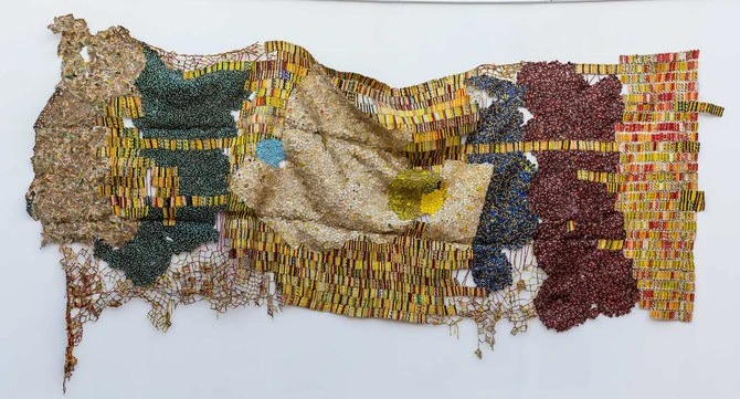 El-Anatsui, TT, 2021, aluminium et fil de cuivre, 300 x 620,6 cm. (Photo fournie)