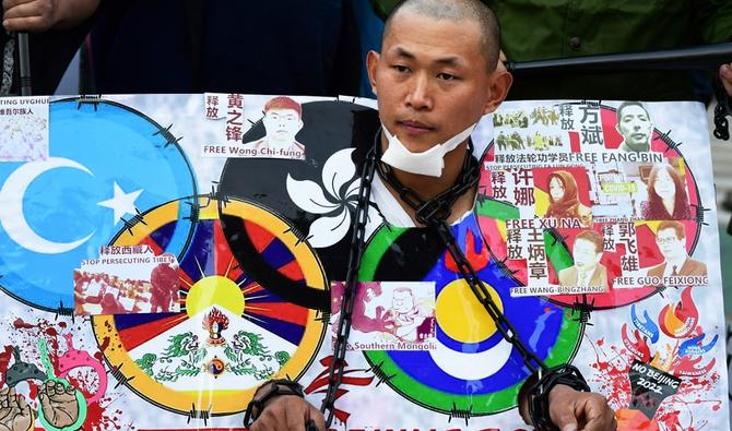 Des militants protestent contre les Jeux Olympiques d'hiver de Pékin 2022 devant le consulat de Chine à Los Angeles, Californie, le 3 février 2022 (Photo, AFP).