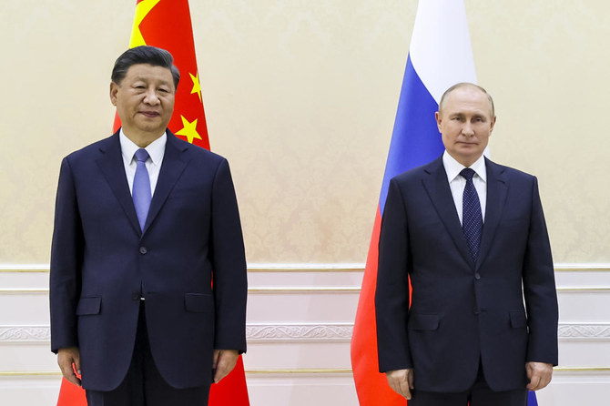 Le président chinois Xi Jinping, à gauche, et le président russe Vladimir Poutine en marge du sommet de l'Organisation de coopération de Shanghai à Samarkand, en Ouzbékistan, le 15 septembre 2022. (Photo du pool du Kremlin via AP)