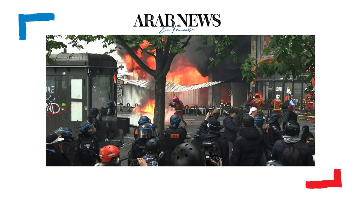 1er-mai à Paris: un immeuble en construction en feu à l'arrivée du défilé place de la Nation