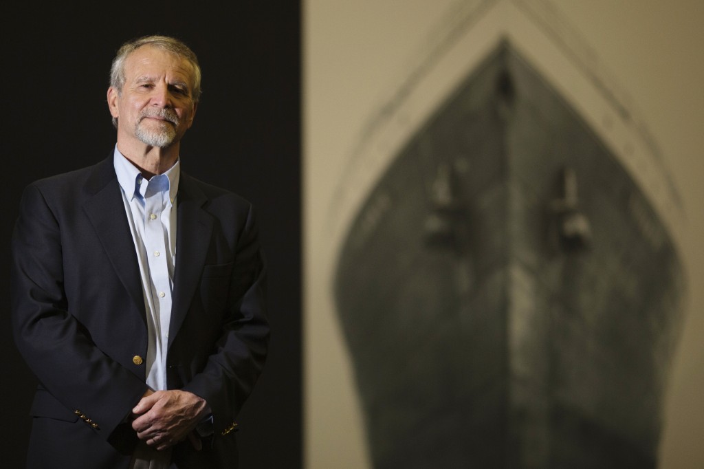 Paul-Henri Nargeolet, directeur d'un projet de recherche sur les grands fonds océaniques consacré au Titanic, pose à l'intérieur de la nouvelle exposition consacrée au navire naufragé, à "Paris Expo", le 31 mai 2013, à Paris. (Photo par Joël SAGET / AFP)