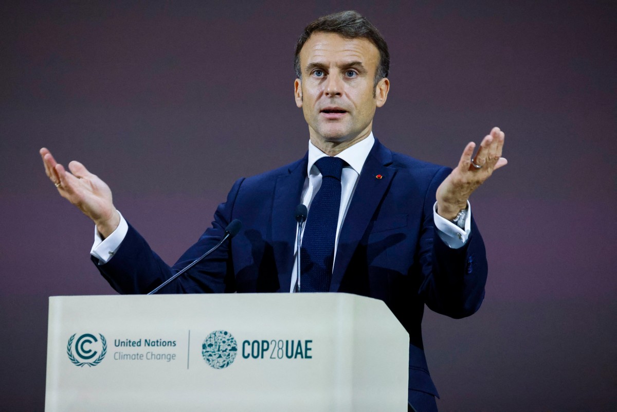 Le président français Emmanuel Macron s'exprime lors d'une réunion sur la "forêt et l'océan" au sommet des Nations unies sur le climat à Dubaï, le 2 décembre 2023. (Photo Ludovic Marin / AFP)
