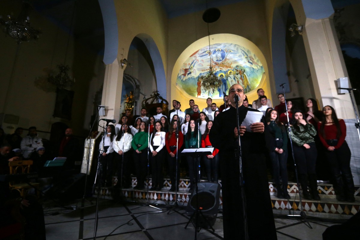 Des Syriens chantent Noël dans une église de la capitale Damas, le 23 décembre 2023. (Photo Louai Beshara AFP)