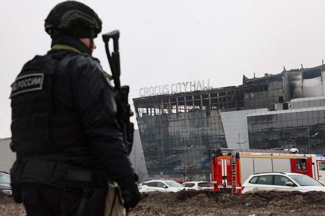Des hommes en tenue de camouflage ont ouvert le feu à l'arme automatique sur des spectateurs de concerts près de Moscou vendredi, tuant au moins 60 personnes et en blessant 145. (AFP)