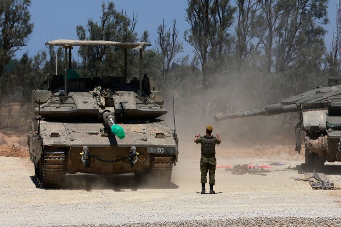 Des chars de l'armée israélienne prennent position dans le sud d'Israël, près de la frontière avec la bande de Gaza, dans le cadre du conflit entre Israël et le mouvement palestinien Hamas. (File/AFP)