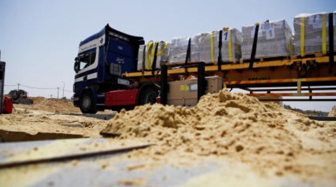 Le Conseil norvégien pour les réfugiés a averti que 2 000 camions d'aide étaient bloqués en Égypte au poste-frontière de Rafah, « privant activement » les Palestiniens de Gaza de biens essentiels. (Reuter/Dossier)